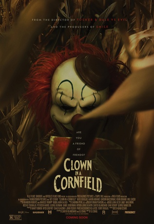 Un clown dans un champ de maïs