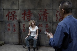 Une scène du film Lucy Une scène du film Lucy